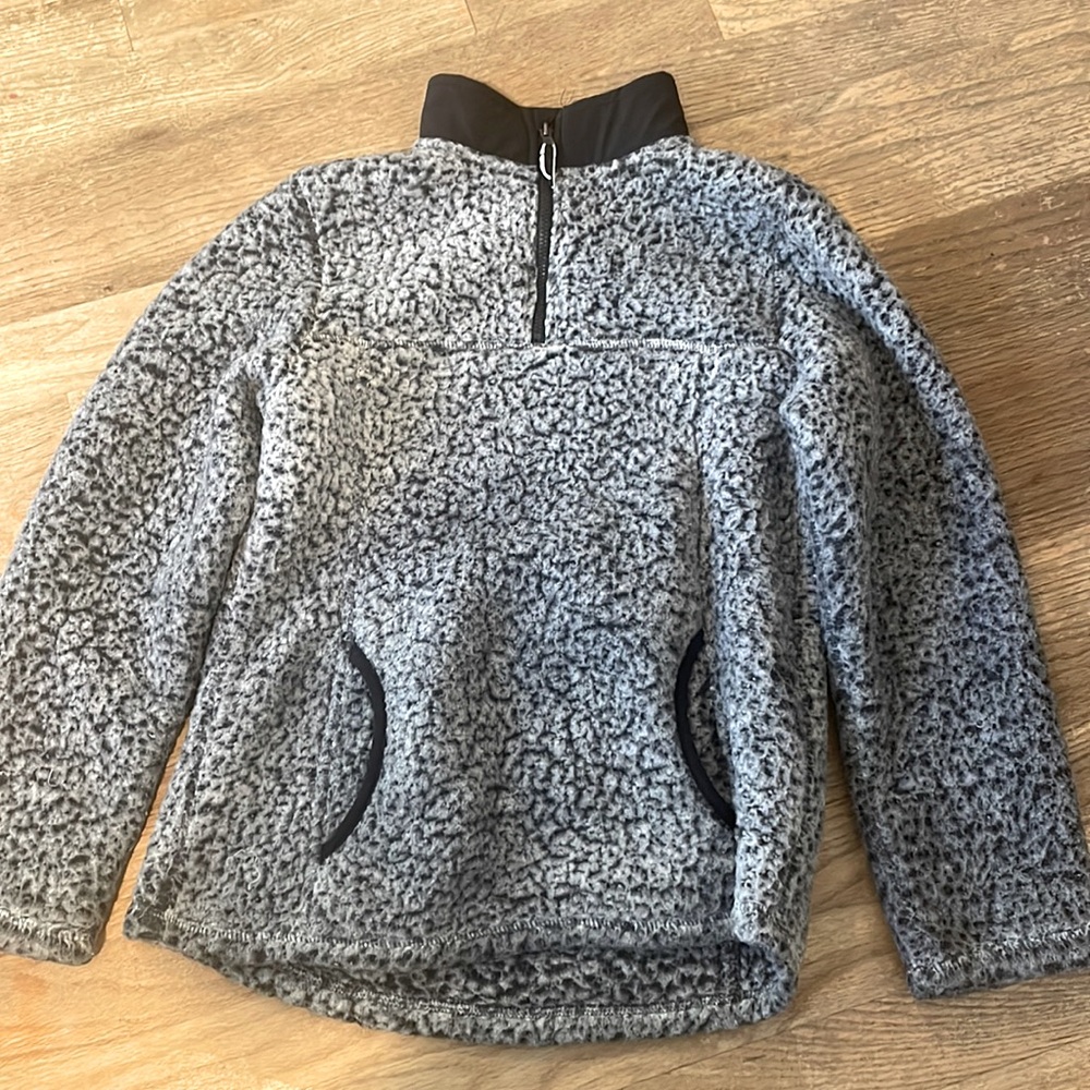 Grey and black fuzzy sweater. Kids small. The brand is Wonder Nation.
